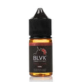 Black-topped blvk unicorn caramel tobacco 30ml nic salt bottle with amber liquid and red black label for vape use